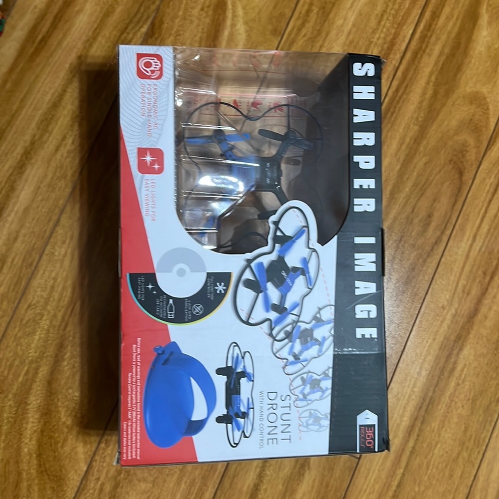 Sharper image stunt drone  with hand control